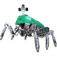 The robot has six metallic jointed legs, a green shell base and a mast with three cameras for a head. 
